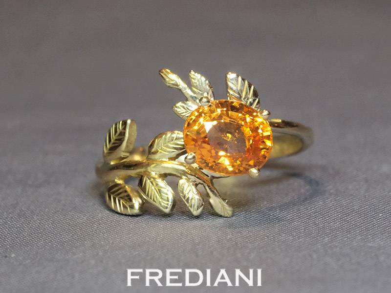 Bague en or jaune 750/000 sertie d'un grenat spessartite naturel