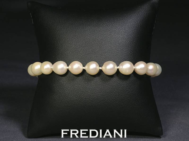 Bracelet en perles de culture 8 mm et fermoir en argent 925/000