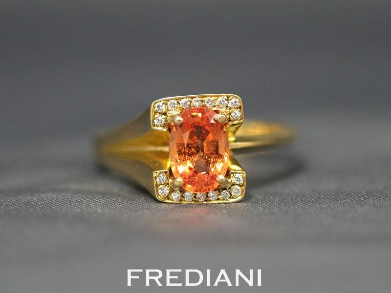 Bague en or jaune saphir orange et diamants