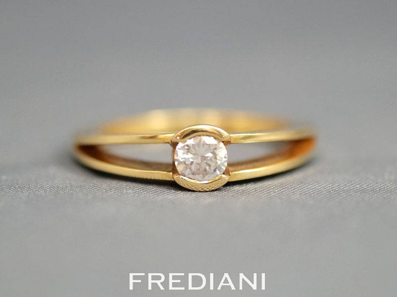 Solitaire en or jaune et diamant