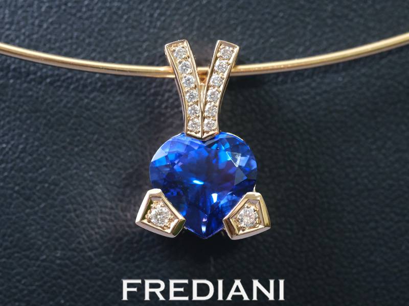 Pendentif en or rouge serti d'une tanzanite coeur et 14 Diamants