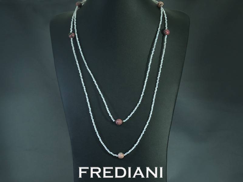 Sautoir composé d'agate et de 6 rhodonites en formes de boules.