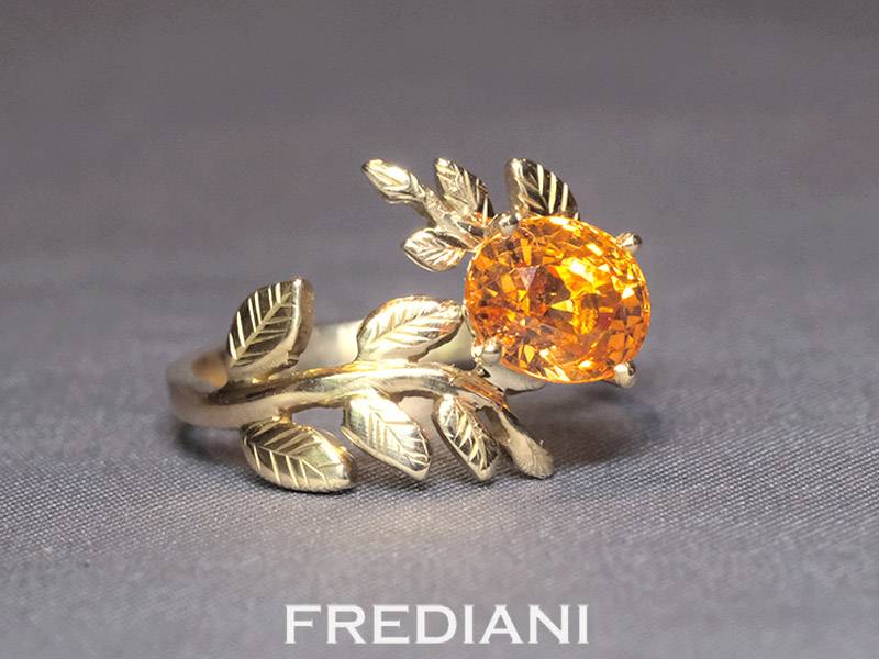 Bague en or jaune 750/000 sertie d'un grenat spessartite naturel