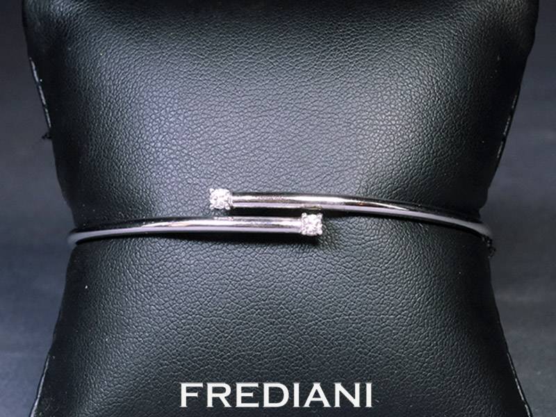 Bracelet en or blanc 750/000 serti de 2 diamants naturels 