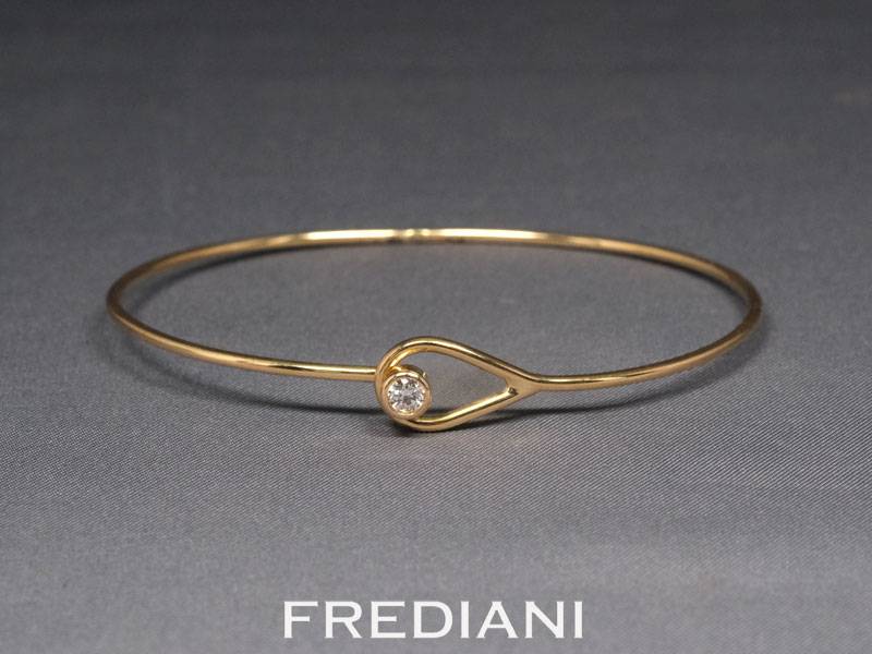 Bracelet or jaune serti d'un diamant