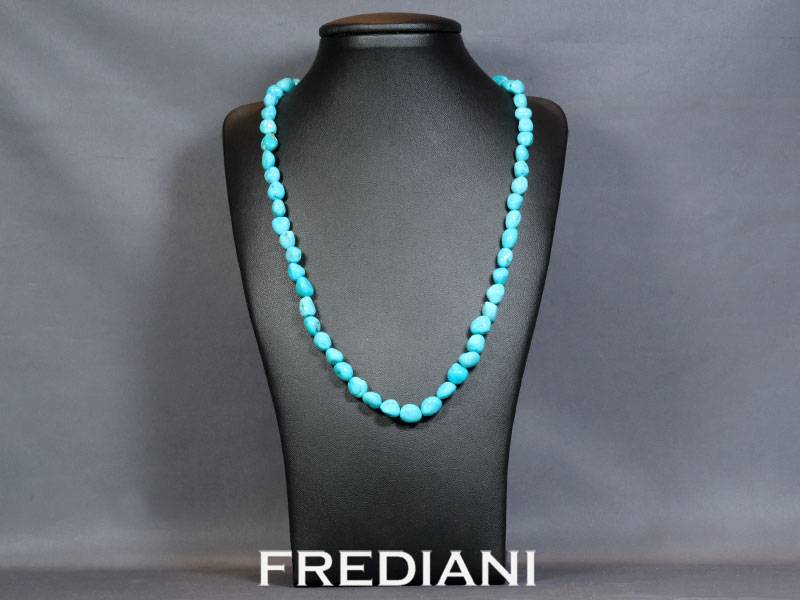 Collier en Turquoises naturelles d'Arizona de la célèbre mine Sleeping beauty avec son fermoir en argent 925/000