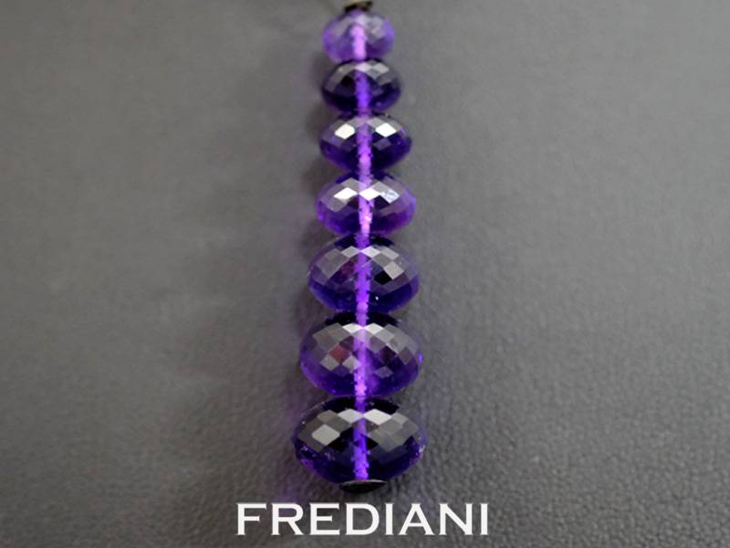 Pendentif en argent avec 7 boules d'améthystes briolettes