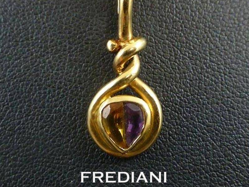Pendentif en or jaune Améthystes et Citrine