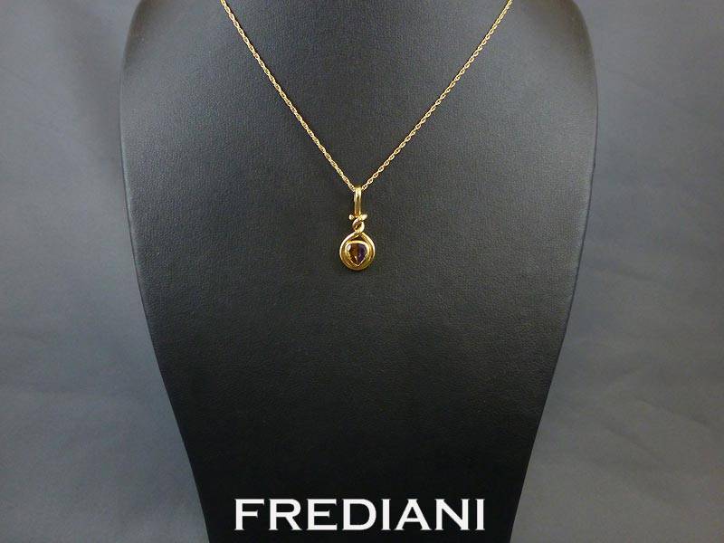 Pendentif en or jaune Améthystes et Citrine
