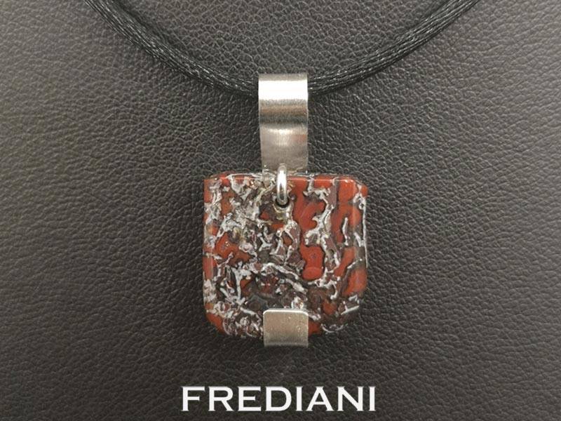 Pendentif en or blanc et os de dinosaure fossilisé