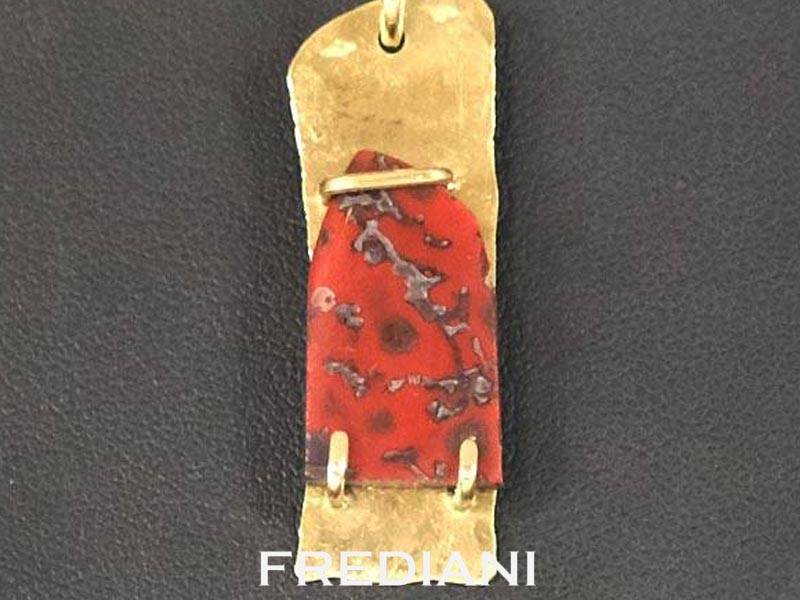 Pendentif en Or jaune serti d'un Os de dinosaure fossilisé